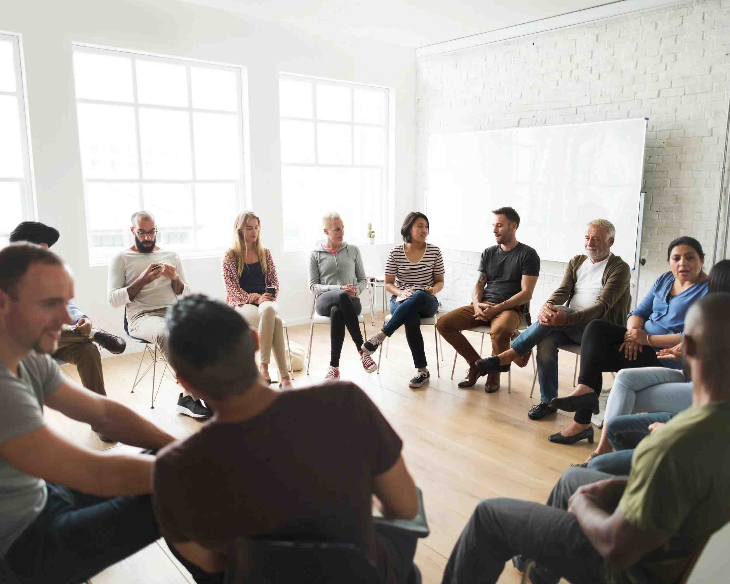 Group counseling session fostering trust, listening, and shared healing through guided dialogue.