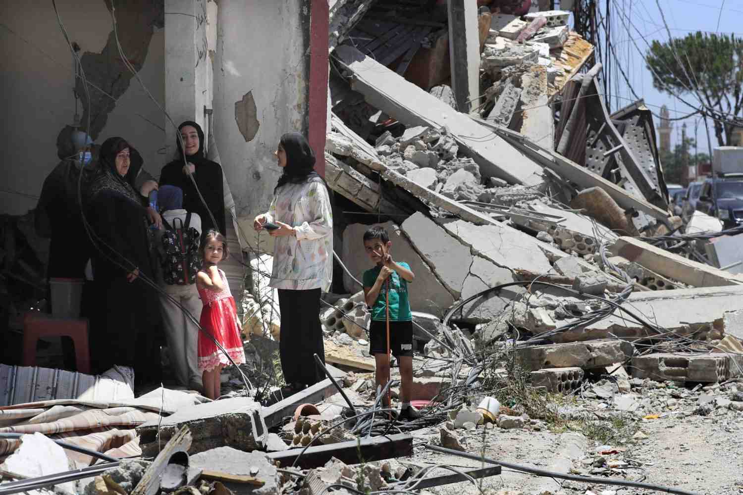 Citizens inspect the ruins of their home in South Lebanon.