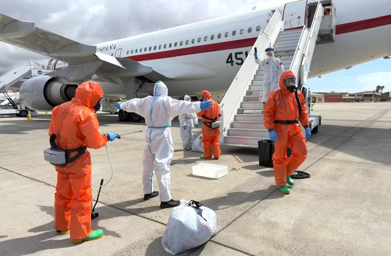 A Spanish passenger is sprayed with disinfectant by Spanish government officials before boarding a plane after disembarking from the hantavirus-stricken cruise ship MV Hondius at Tenerife airport in the Canary Islands, Spain, Sunday, May 10, 2026. Associated Press A Spanish passenger is sprayed with disinfectant by Spanish government officials before boarding a plane after disembarking from the hantavirus-stricken cruise ship MV Hondius at Tenerife airport in the Canary Islands, Spain, Sunday, May 10, 2026. Associated Press