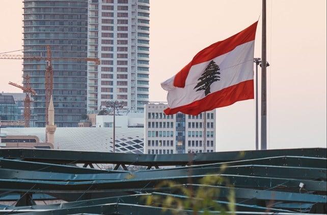 The Lebanese flag waves over the Beirut skyline The Lebanese flag waves over the Beirut skyline