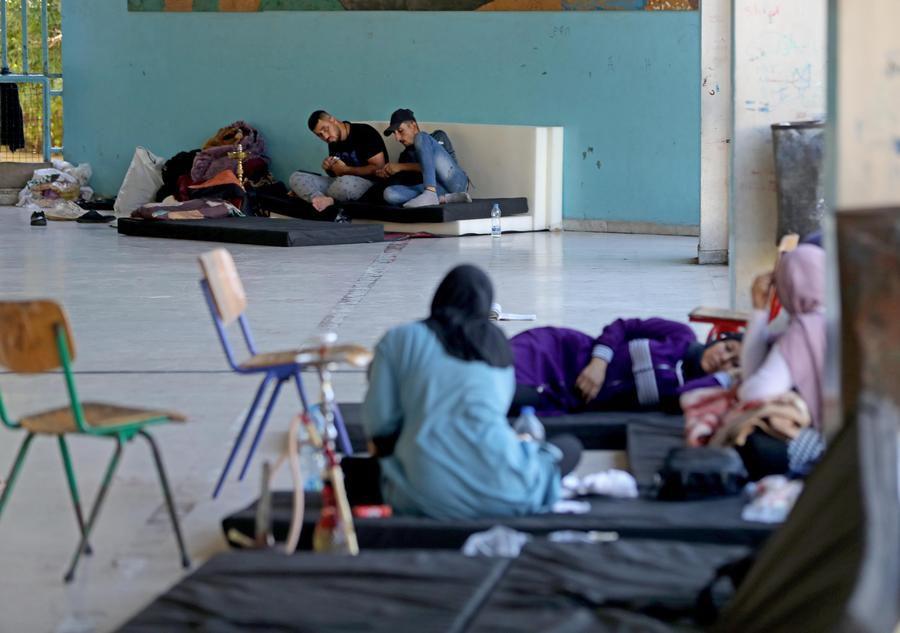 Displaced people from southern Lebanon are seen in a temporary shelter at a school in Beirut, Lebanon on Sept. 26, 2024. (Xinhua/Bilal Jawich) Displaced people from southern Lebanon are seen in a temporary shelter at a school in Beirut, Lebanon on Sept. 26, 2024. (Xinhua/Bilal Jawich)