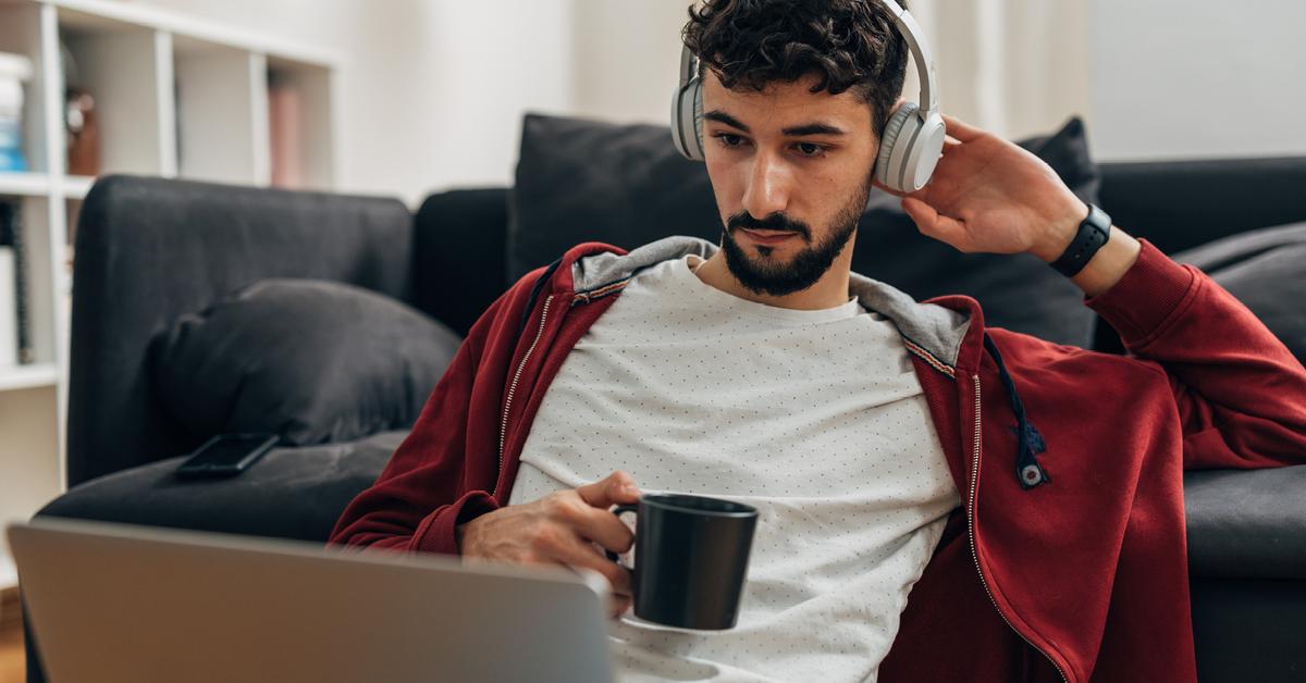 A young man wearing headphones A young man wearing headphones