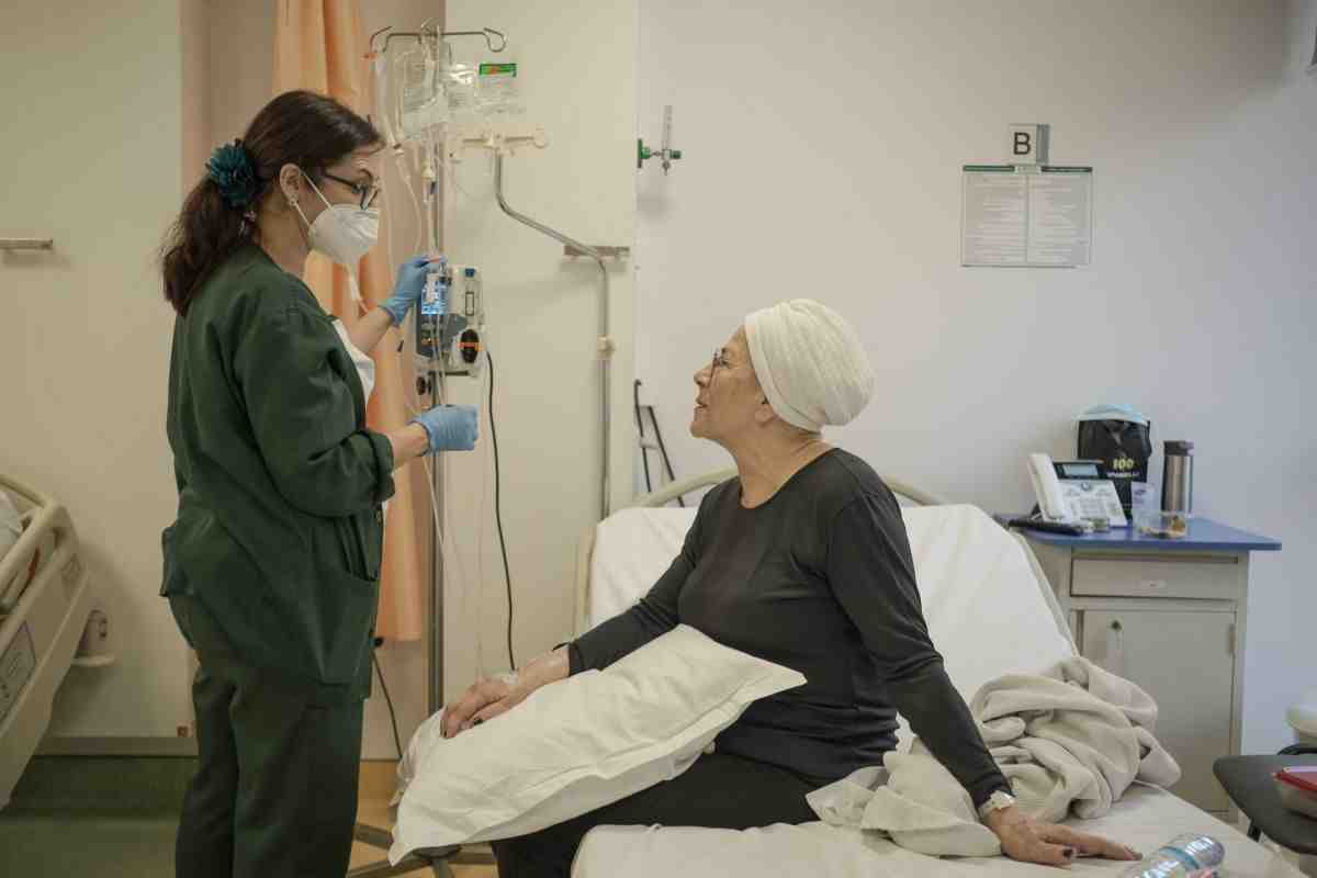 In a hospital in Beirut, a nurse taking care of a patient. (Credit: João Sousa)