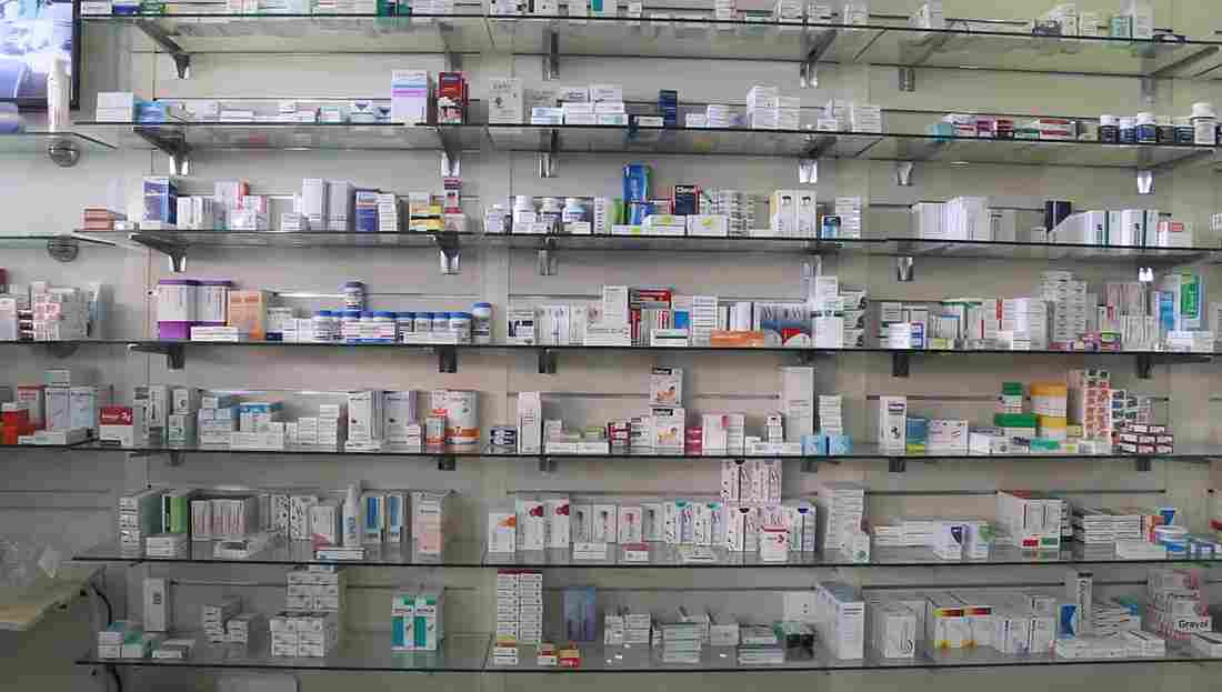 Shelves of medicines in a pharmacy — Photo by Maya Hamadeh