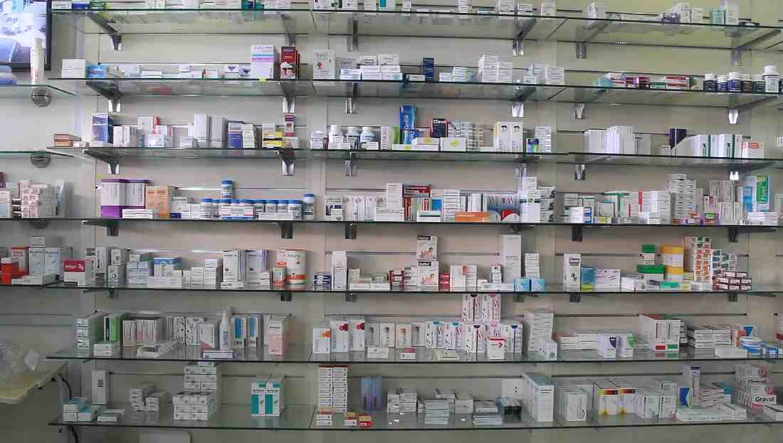 Shelves of medicines in a pharmacy — Photo by Maya Hamadeh